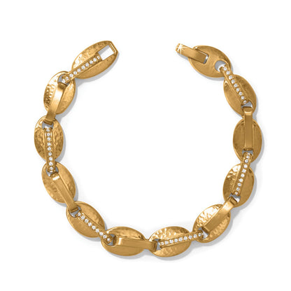 Brighton bracelet with hammered gold-plated oval links and crystal-set bar accents on a white background
