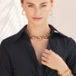 Model wearing a Brighton layered gold-plated necklace with crystal accents and coordinating Brighton accessories