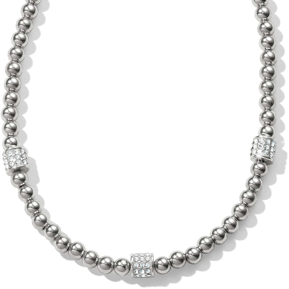Brighton beaded necklace with silver-plated round beads and crystal pavé barrel stations on a white background