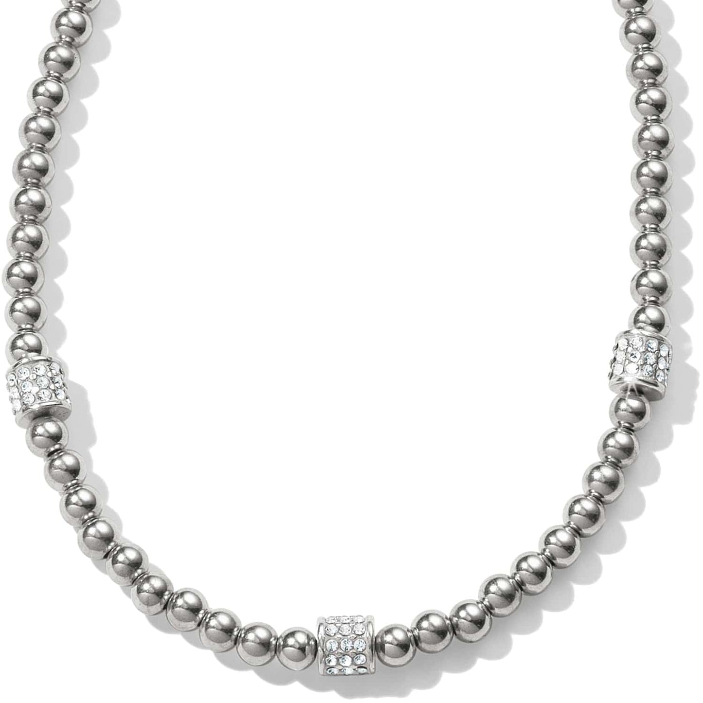 Brighton beaded necklace with silver-plated round beads and crystal pavé barrel stations on a white background