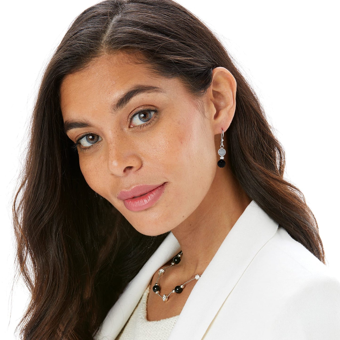 Model wearing Brighton silver-plated drop earrings with crystal pavé disc and black bead, paired with coordinating Brighton necklace