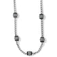 Brighton silver-tone chain necklace with black lacquer barrel stations set with crystals on a white background