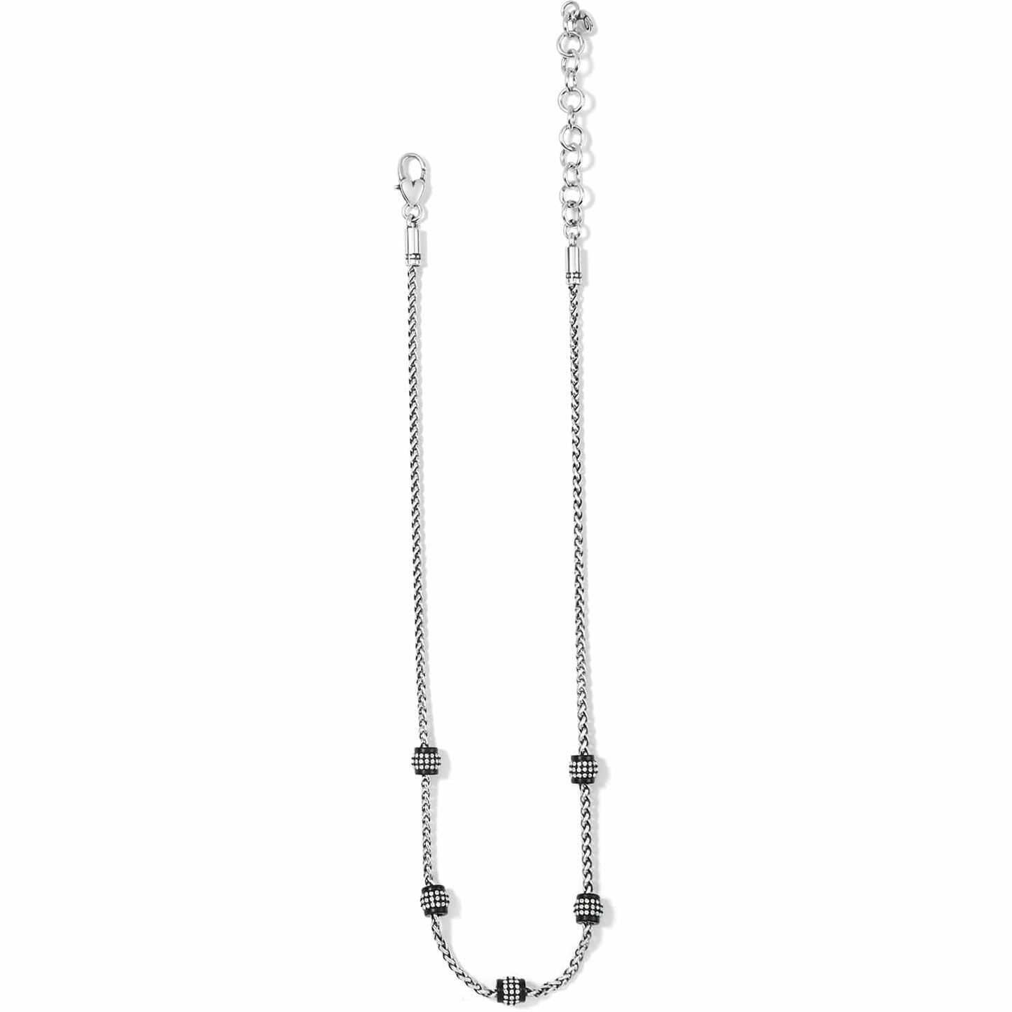 Brighton silver-tone necklace with five black crystal-studded barrel beads and lobster clasp on a white background
