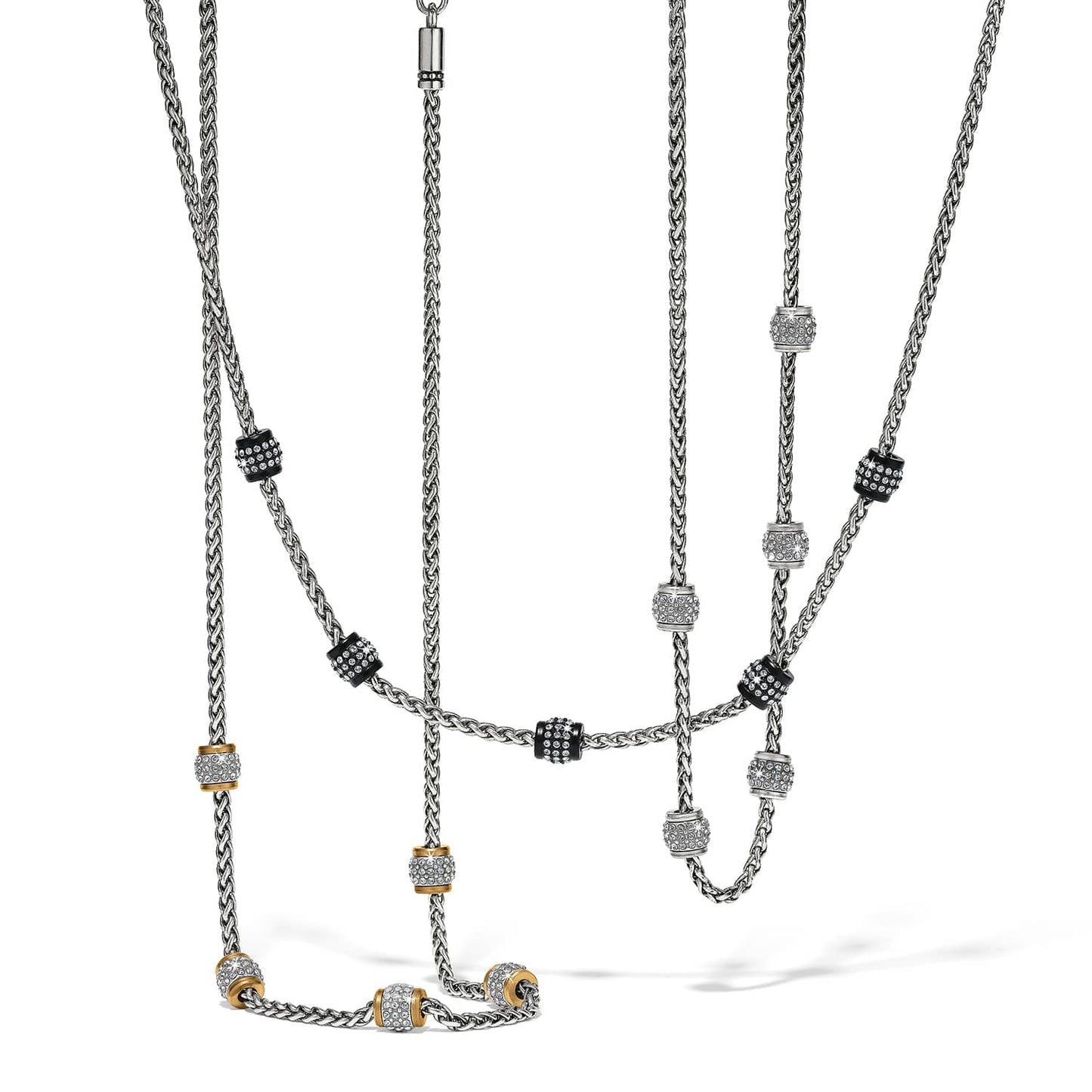 Brighton layered chain necklaces with crystal beaded stations in silver, gold, and black finishes on a white background