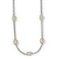 Brighton necklace with silver-plated wheat chain and five gold-plated barrel stations set with crystals on a white background