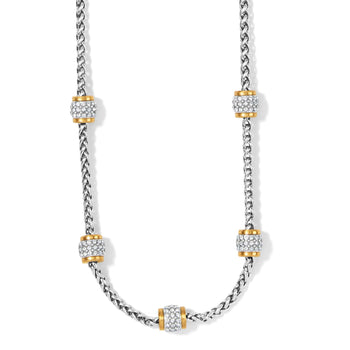 Brighton necklace with silver-plated wheat chain and five gold-plated barrel stations set with crystals on a white background