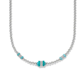 Brighton silver-plated beaded necklace with turquoise stone stations and crystal pavé accents on a white background
