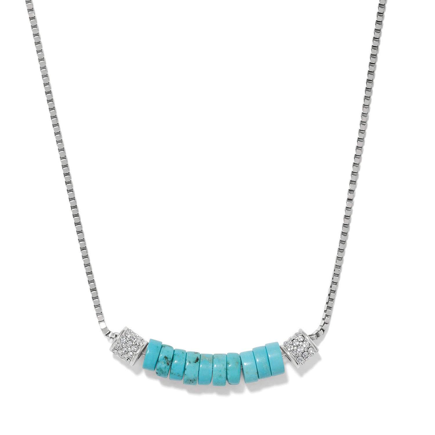 Brighton necklace with turquoise disc beads and silver-plated crystal accent stations on a fine chain, on a white background