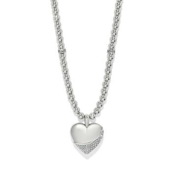 Brighton beaded necklace with silver-tone polished beads and heart pendant featuring crystal pavé accent on a white background