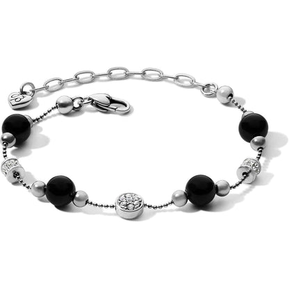 Brighton bracelet with black beads, silver-plated accents, and crystal pave stations with lobster clasp on a white background