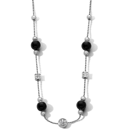 Brighton beaded necklace with black beads, silver-plated beads, and crystal pavé rondelle stations on a white background