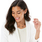 Model wearing a Brighton silver-plated station necklace with black beads and crystal accents paired with matching drop earrings