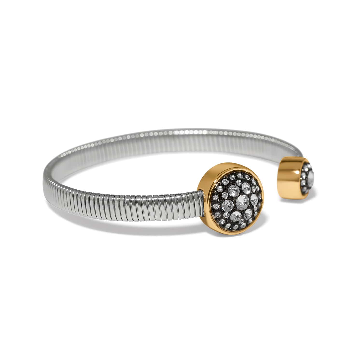Brighton cuff bracelet with silver-tone flexible band and two-tone gold crystal pavé discs on a white background