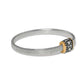 Brighton two-tone stretch bracelet with silver-tone band and gold accent featuring crystal-encrusted station on a white background