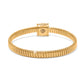 Brighton bangle bracelet in gold-plated finish with ribbed texture and crystal-accented clasp on a white background