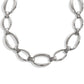 Brighton necklace with large silver-plated oval links connected by rectangular bar accents on a white background