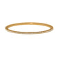 Brighton bangle bracelet with gold-plated finish and a single row of crystal accents on a white background