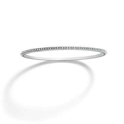 Brighton bangle bracelet with silver-plated finish and pavé crystal detailing along the band on a white background