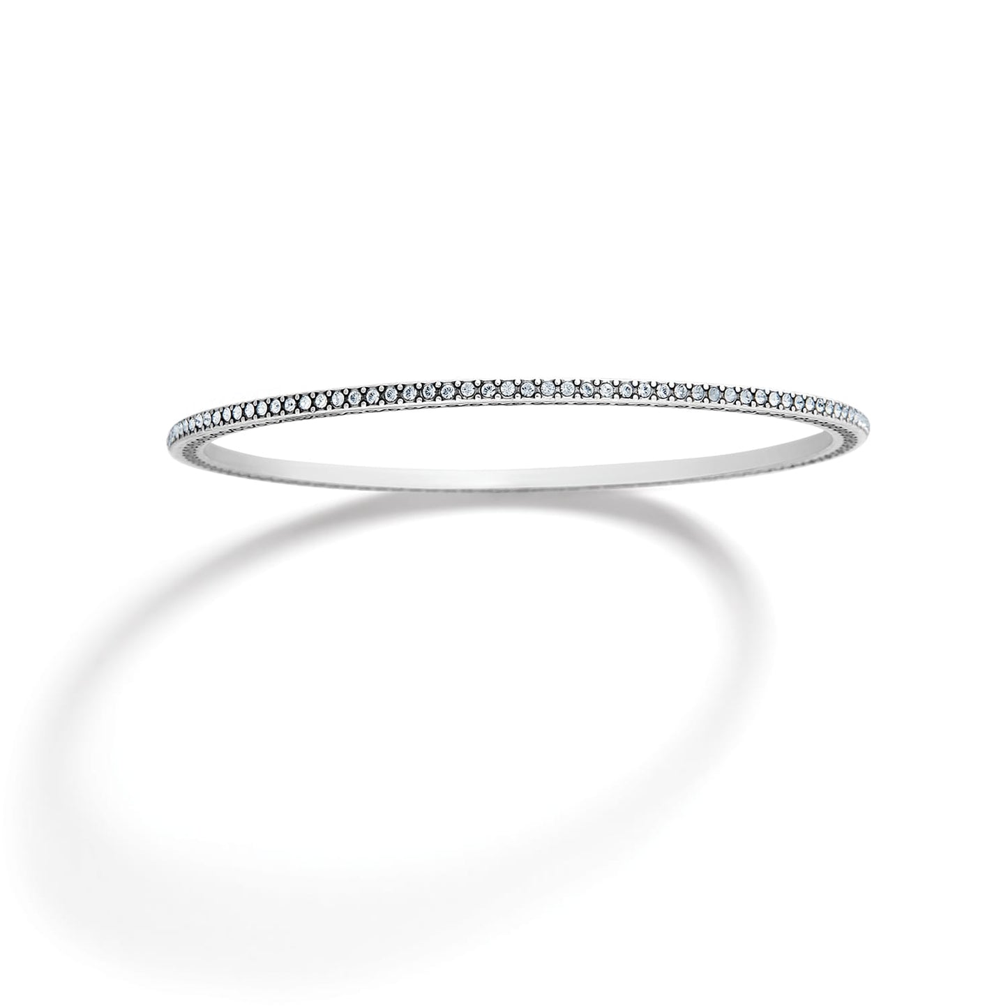 Brighton bangle bracelet with silver-plated finish and pavé crystal detailing along the band on a white background