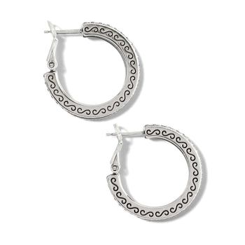 Brighton hoop earrings with silver-plated scroll patterns and crystal accents along the outer edges on a white background