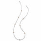 Brighton two-tone necklace with silver-tone chain and gold-tone stations set with crystals on a white background