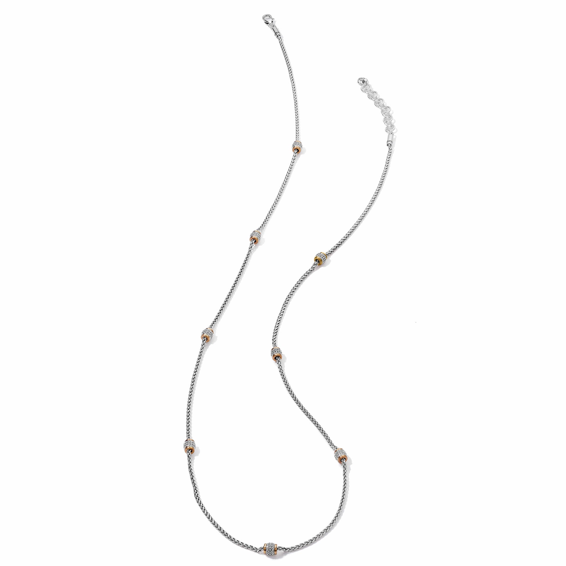 Brighton two-tone necklace with silver-tone chain and gold-tone stations set with crystals on a white background