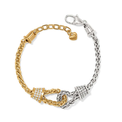 Brighton two-tone bracelet with gold and silver woven chains, crystal-pavé accents, and lobster clasp on a white background