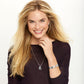 Model wearing a Brighton silver-plated pendant necklace with crystal rectangular charms and coordinating Brighton bracelets