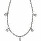 Brighton silver-tone chain necklace with five small square crystal charms spaced along the chain on a white background
