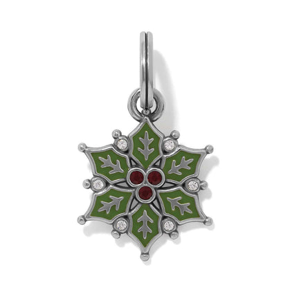 Brighton snowflake charm with green enamel, red and clear crystals, and silver-plated finish on a white background