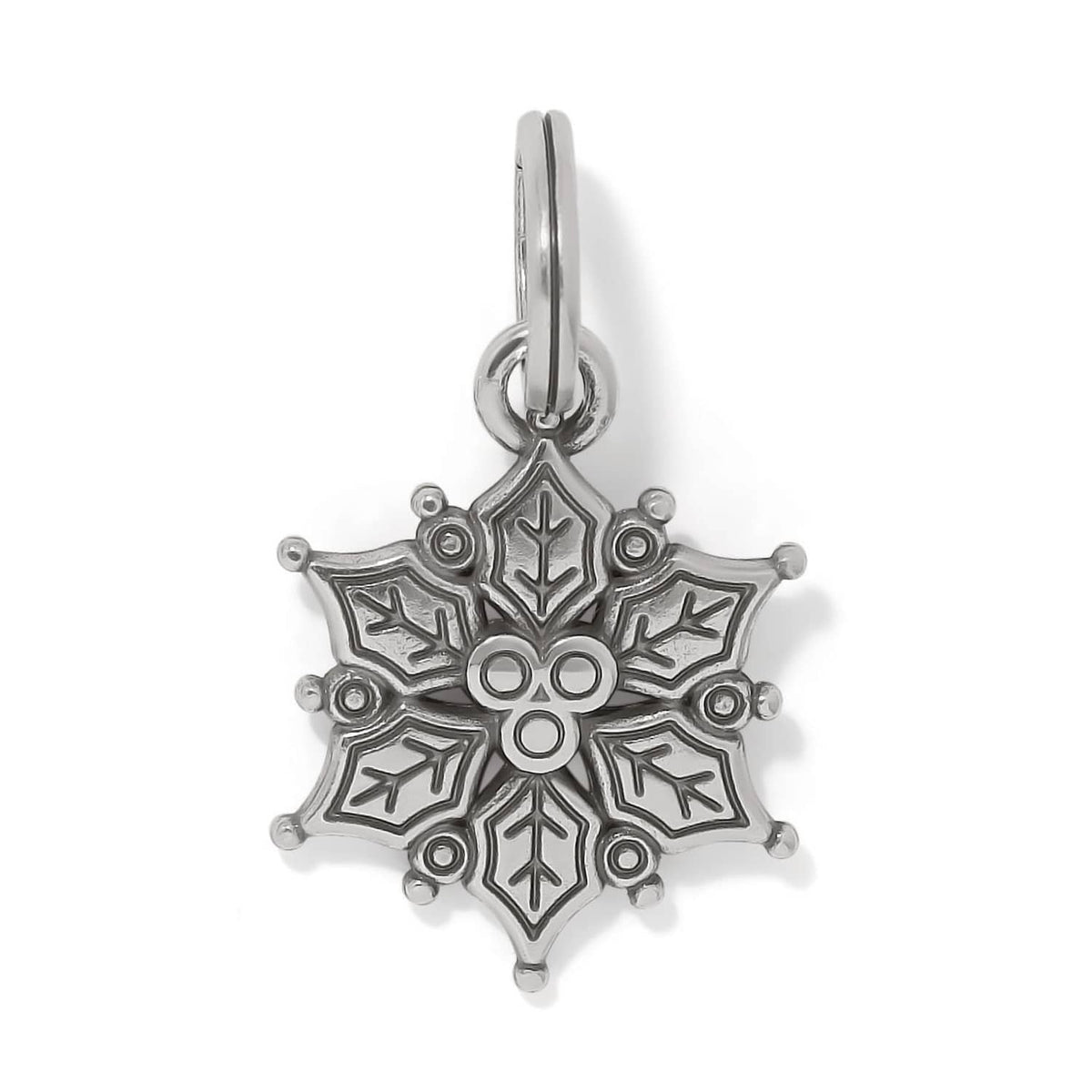 Brighton snowflake charm with silver-plated finish and engraved geometric details on a white background