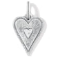 Brighton heart charm with silver-plated finish, radiating textured rays and raised center heart on a white background
