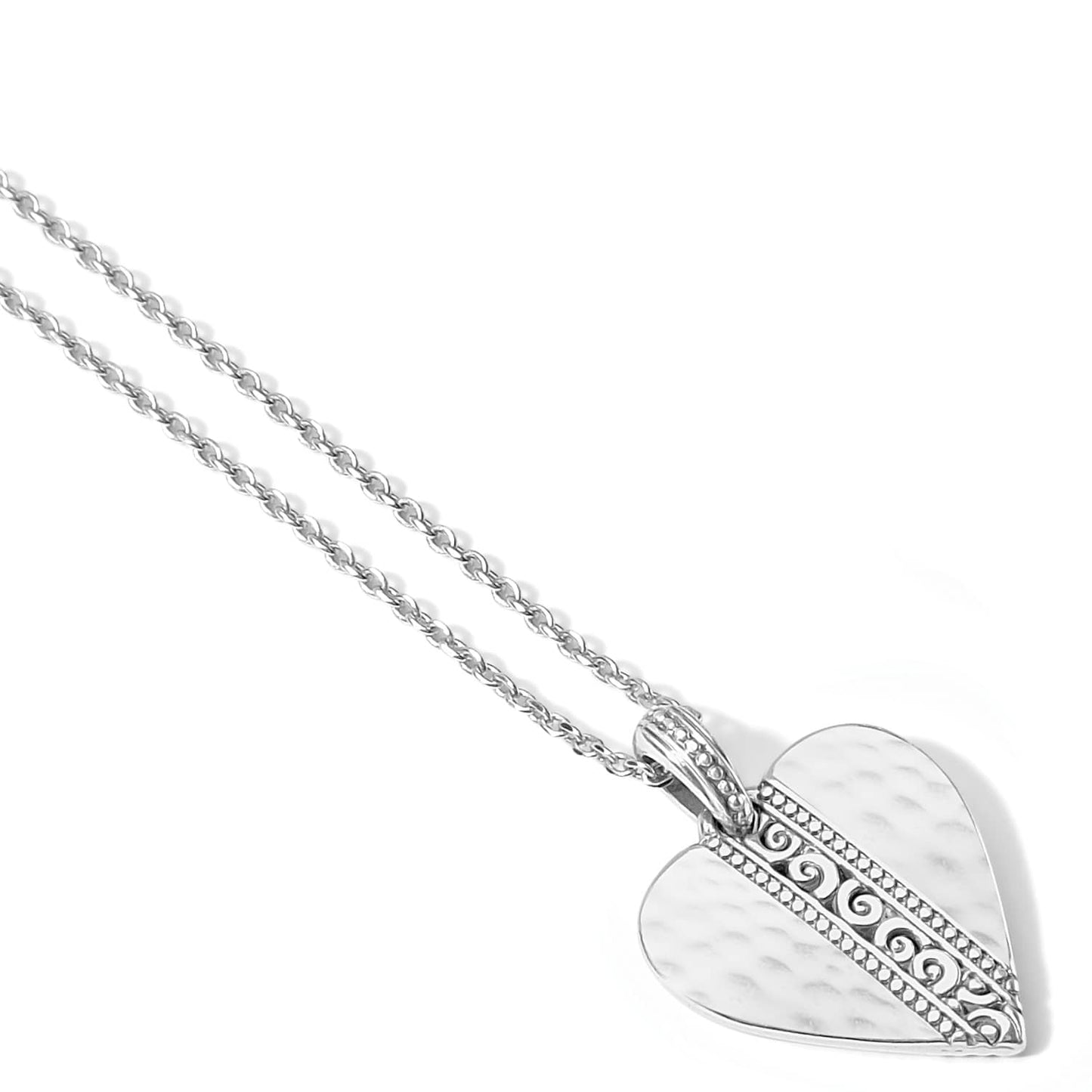 Brighton heart pendant necklace with hammered silver-plated finish and scrollwork detail on a white background
