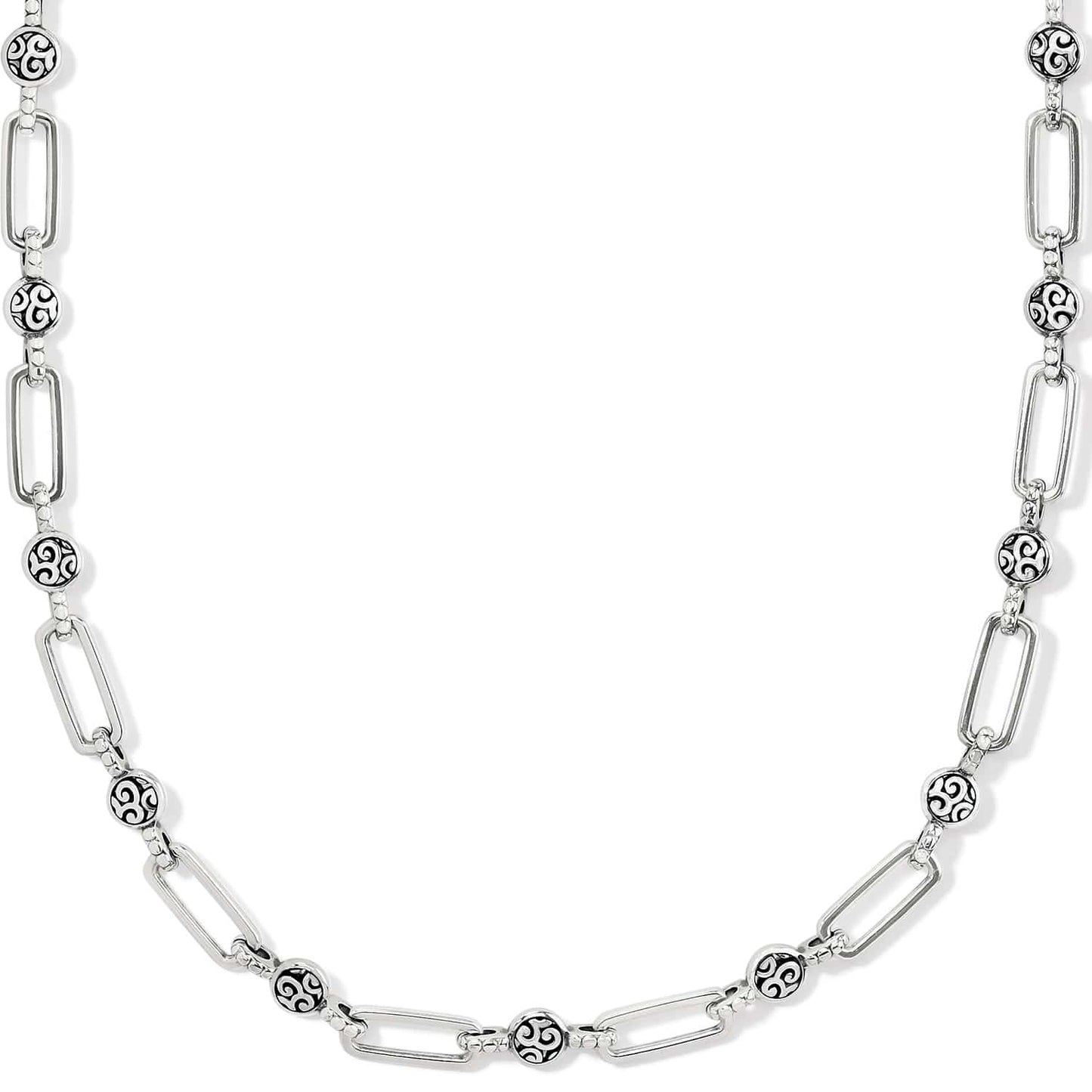 Brighton silver-plated chain necklace with elongated links and round scroll-engraved beaded stations on a white background