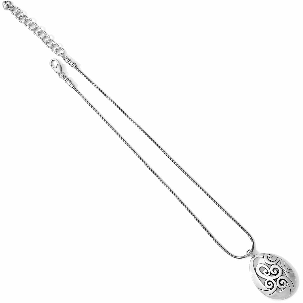 Brighton pendant necklace with silver-plated oval medallion featuring swirl design and snake chain on a white background