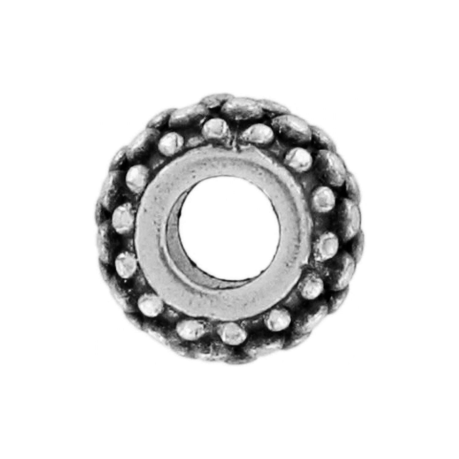Brighton spacer bead charm with silver-tone beaded texture and open center threading hole on a white background