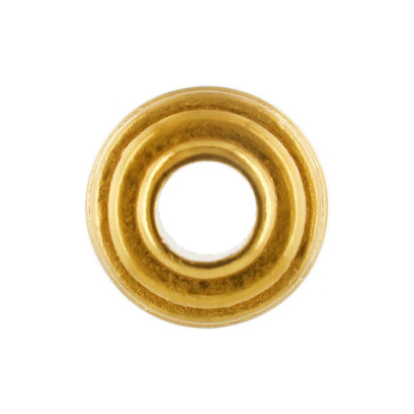 Brighton bead with gold-tone finish and ridged concentric rings around a central opening on a white background