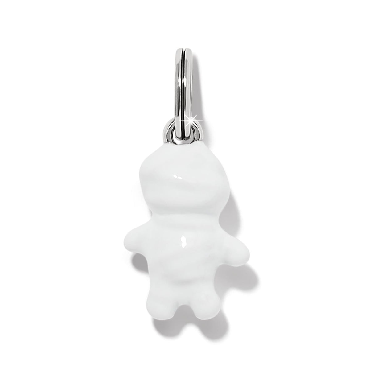 Brighton charm with white enamel figure and silver-plated split ring on a white background