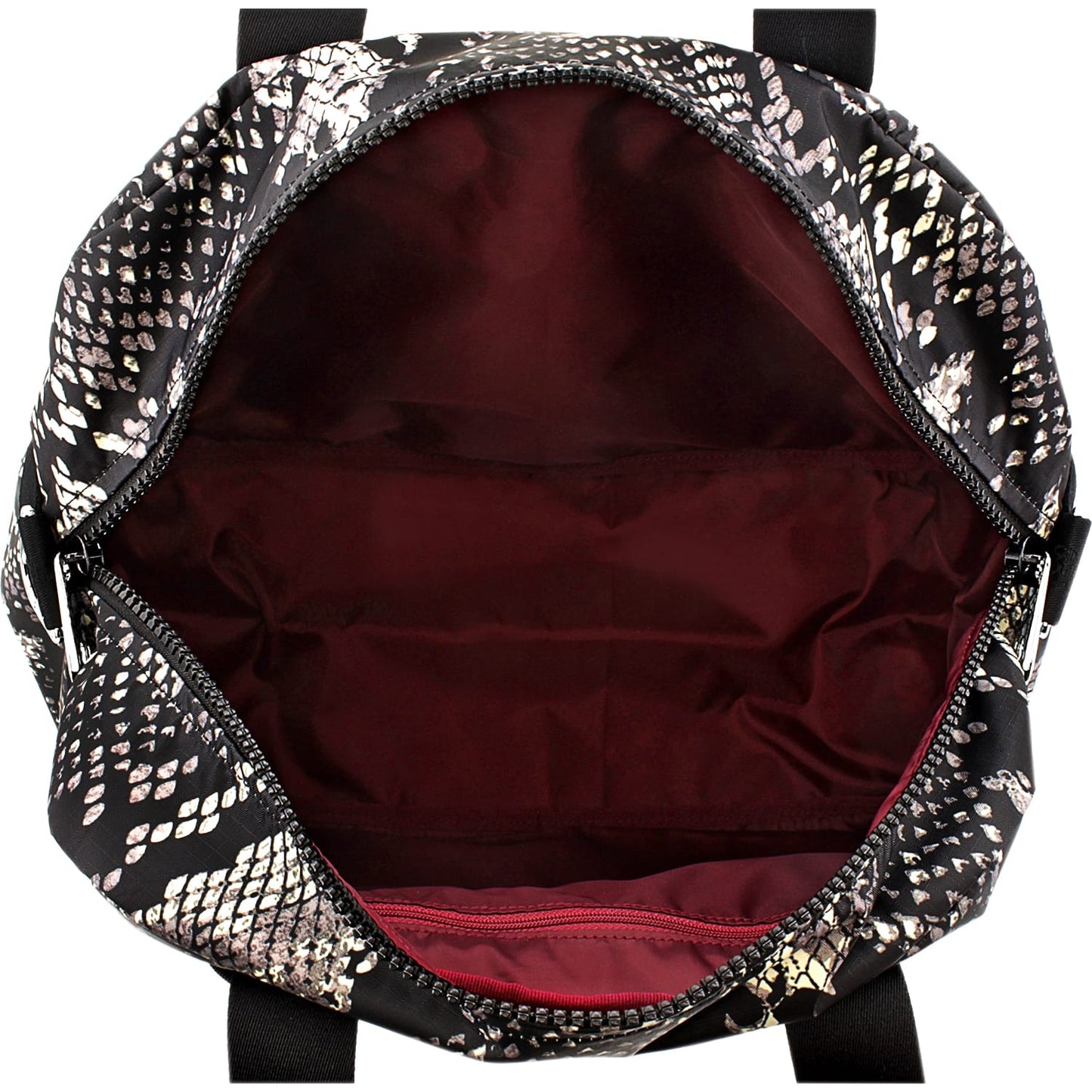 Close-up of Brighton handbag interior view showing burgundy lining, zippered pocket, and snake-print exterior trim