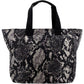 Brighton tote handbag with black and ivory snakeskin print and black canvas handles on a white background