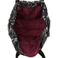 Close-up of Brighton handbag interior view with burgundy lining, zippered pocket, and snakeskin print exterior