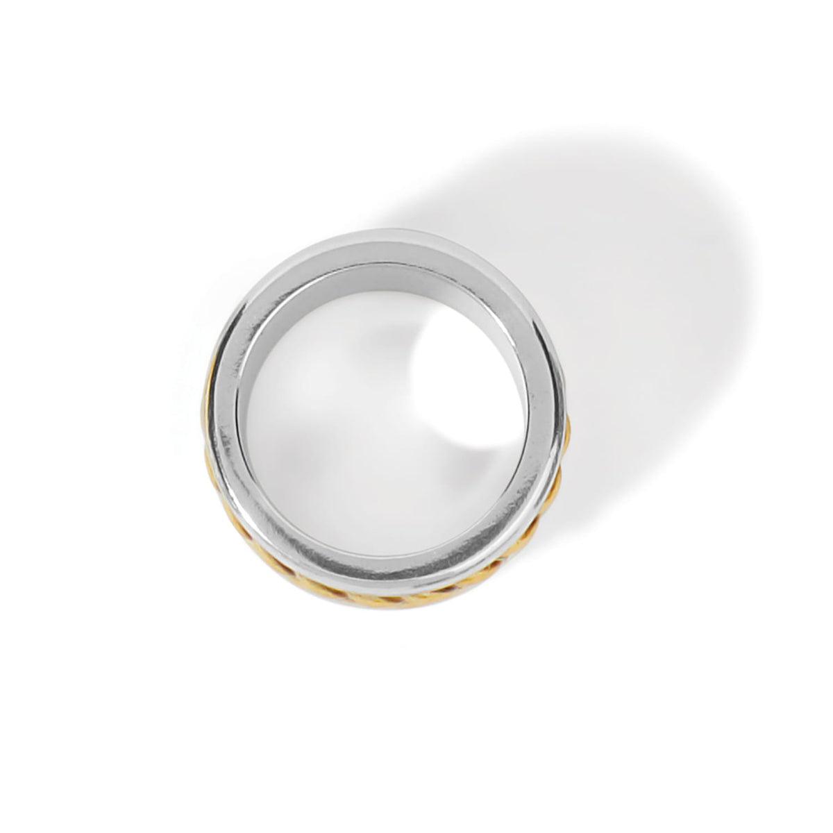 Brighton ring shown from above with two-tone silver band and gold textured edge on a white background