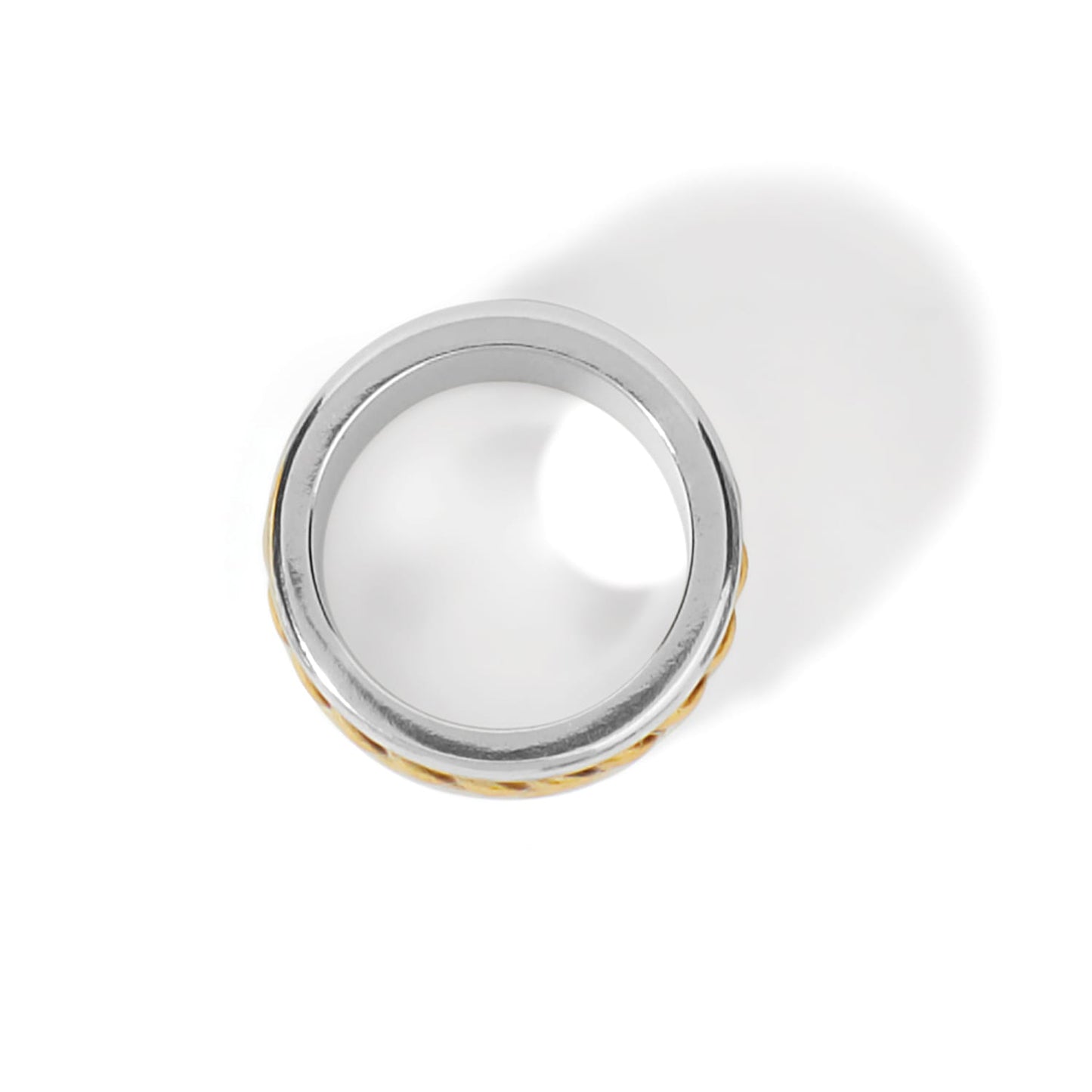 Brighton ring shown from above with two-tone silver band and gold textured edge on a white background