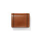 Brighton brown leather bifold wallet with dark vertical stitched accents on front flap on a white background