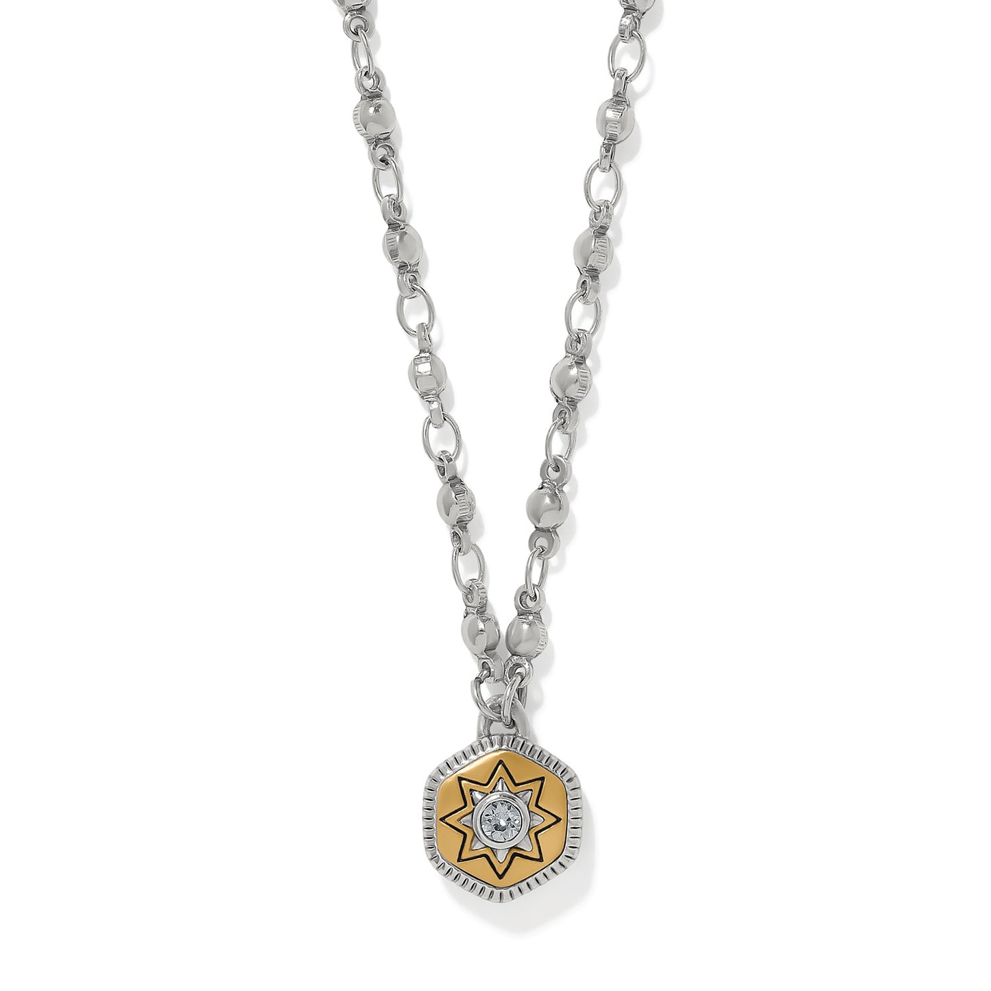 Brighton pendant necklace with two-tone star medallion, crystal center, and silver-tone chain on a white background