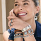 Model wearing Brighton stacked leather bracelets with silver-plated concho accents and coordinating Brighton accessories
