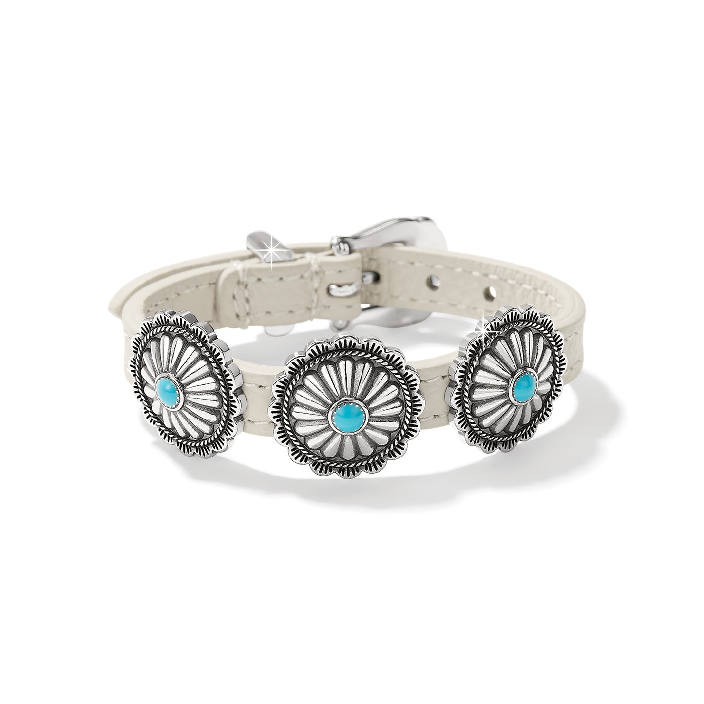 Brighton leather bracelet in cream with three silver-plated concho medallions and turquoise stone centers on a white background