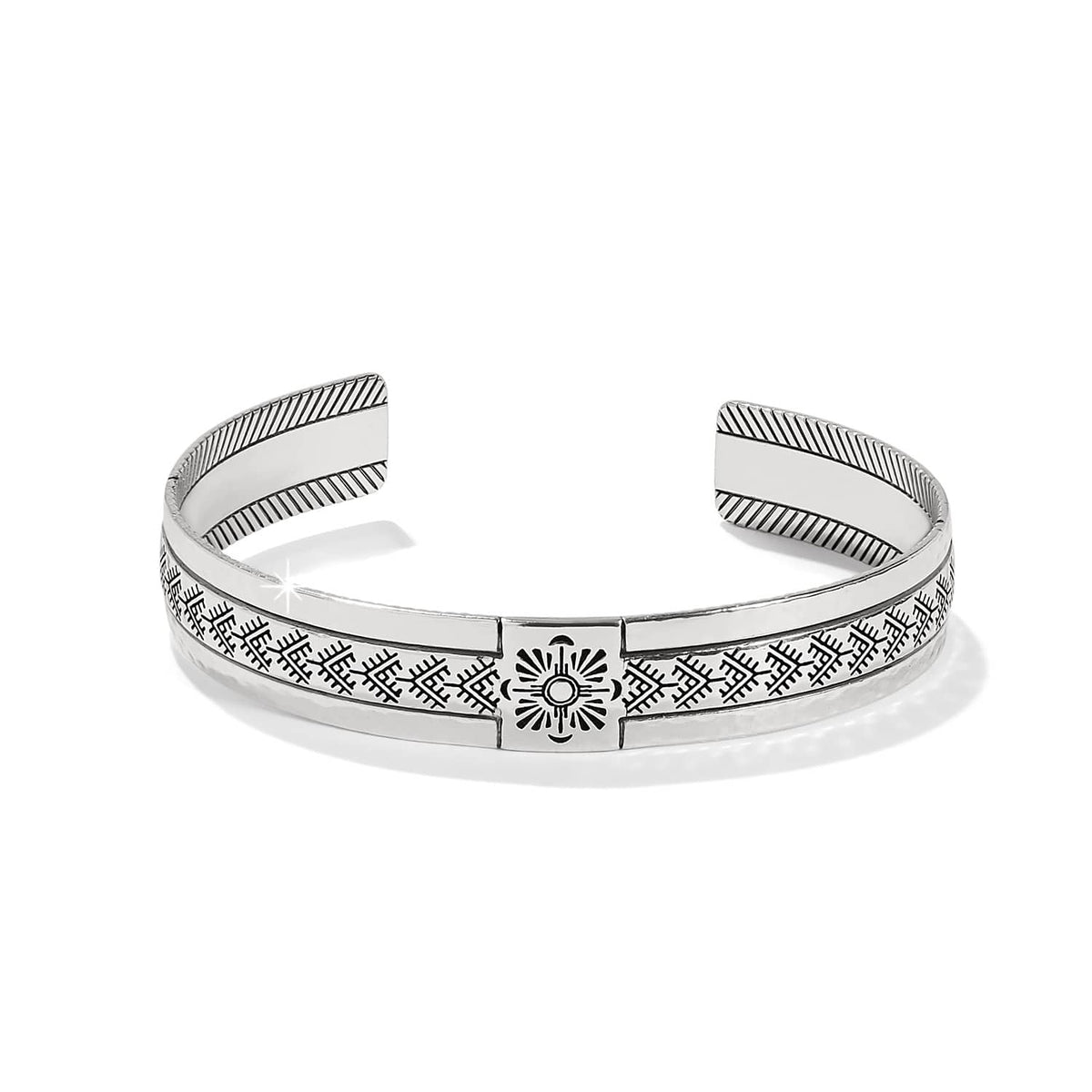 Brighton cuff bracelet with silver-plated finish and engraved geometric sunburst pattern on a white background