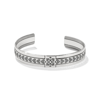 Brighton cuff bracelet with silver-plated finish and engraved geometric sunburst pattern on a white background