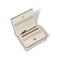 Brighton bifold wallet shown open with cream interior, gold medallion print, card slots, and zippered pocket on a white background